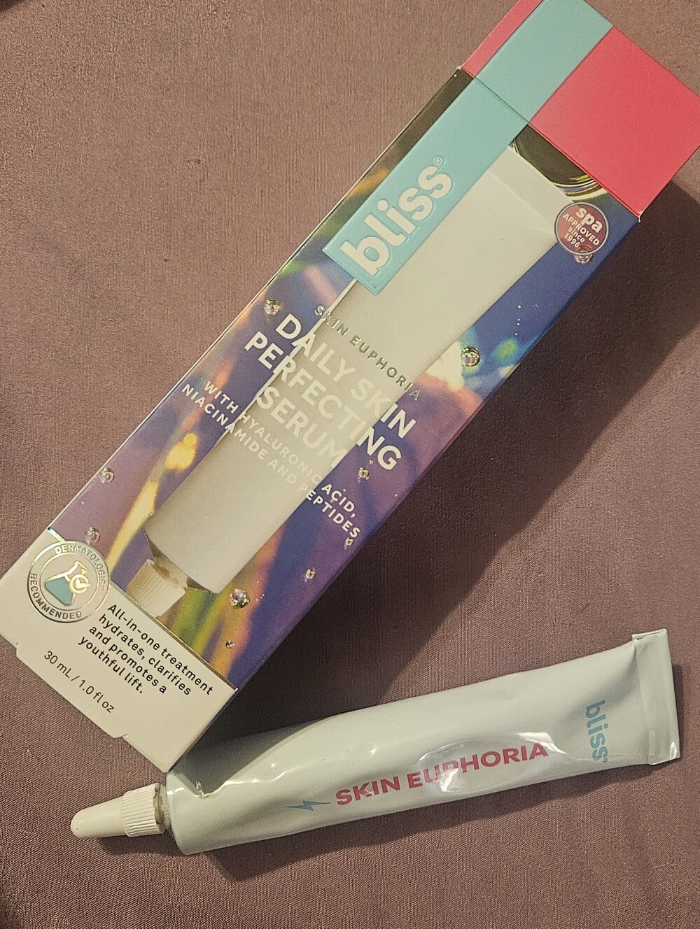 Bliss Skin Euphoria Tube with Pink and Aqua Packaging..Never Worn Or Tube Opened